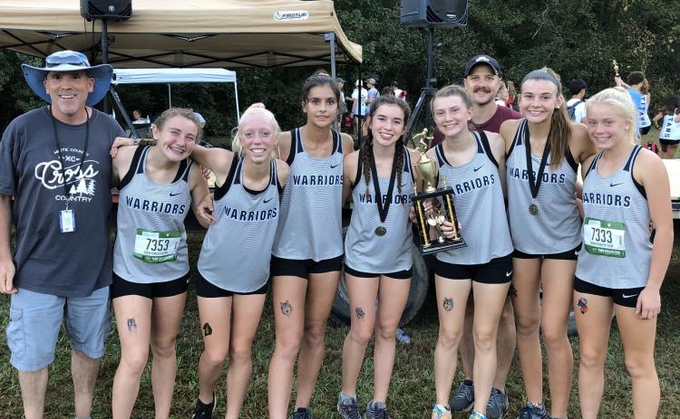 The Lady Warriors posted a runner-up finish in the girls' varsity division behind Oconee County. Members of the WCHS squad are, from left, assistant coach Tom O'Bryant, Josie Stover, Reese Vandegriff, Lily Gearing, Sydnee Nix, Maggie Davidson, head coach Matt Dover, Ellie Gearing, and Nealeigh Broadwell. (Photo/WCHS Athletics)