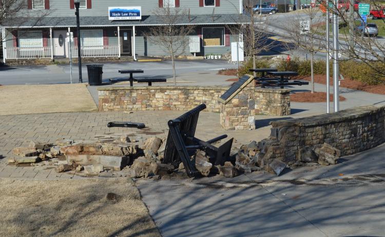 The pursuit ended with the vehicle wrecking at Freedom Park and damaging the brick and stone wall. (Photo/Stephanie Hill)