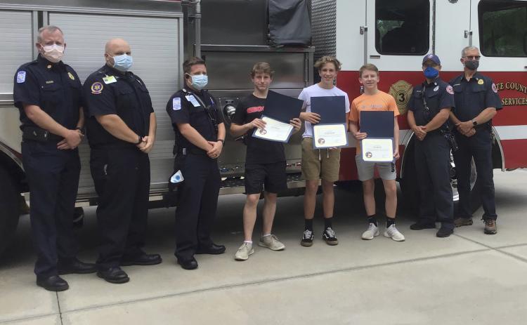 Fire services photo: Pictured, from left, are Fire Chief Seth Weaver, Paramedic Josh Eaten, EMT  Matt Hill, Jack Bandy, Daniel Green, Ben Bandy, Captain Josh Taylor, and Battalion Chief John Lumsden. (Submitted photo)