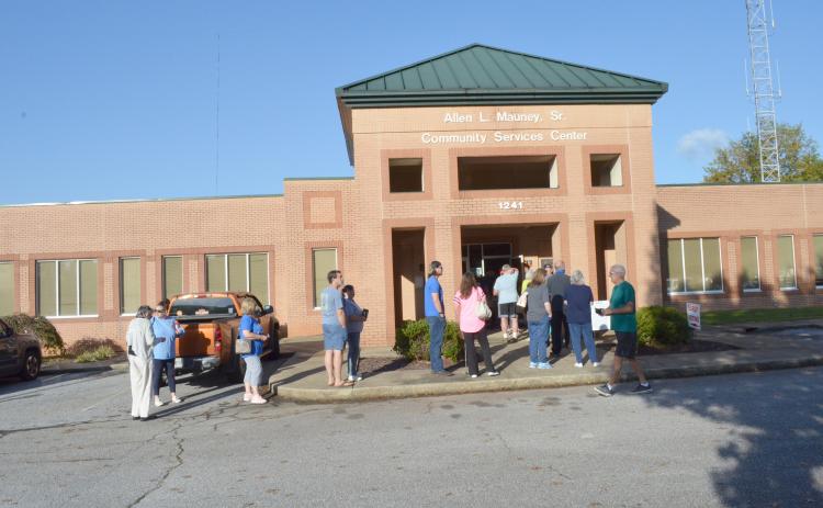 The line of White County residents waiting to cast their ballots on the first day of in-person voting was out the door of the voter registrar’s office at times during the morning of Tuesday, Oct. 13. (Photo/Stephanie Hill)