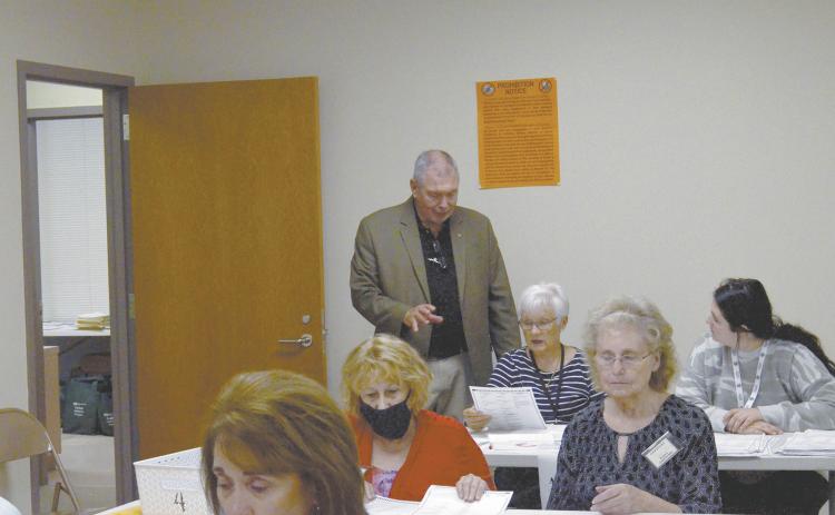 White County Elections Superintendent Garrison Baker (standing) speaks with an audit team Friday, Nov. 13, as a hand count of paper ballots began. (Photo/Wayne Hardy)