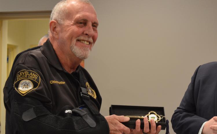 Longtime Cleveland Police Chief John Foster smiles after being presented a “key to the city” during a Dec. 17 event honoring his career. Foster is set to retire this month. (Photo/Stephanie Hill)