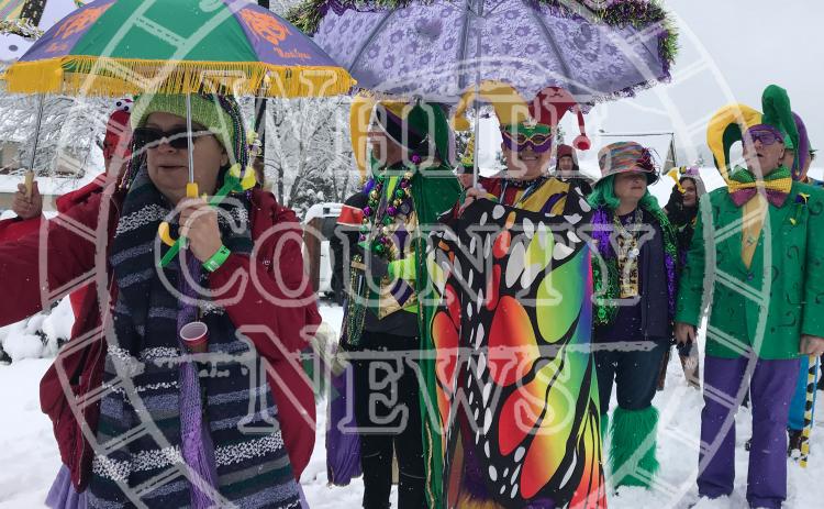 In 2020, the Fasching participants didn’t let the several inches of snow stop them as they made their way through town during the sidewalk parade. (Photo/Stephanie Hill)