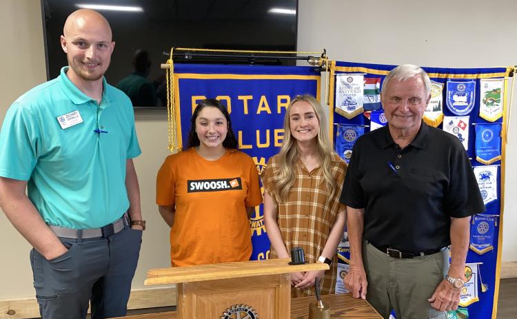 Shown from left are White County Rotary Club president-elect Zach Gerrells, 2021 White County Rotary Club scholarship recipients Cassandra Satterlee-Ortiz and Madison Adams, and Rotary Club scholarship committee member Gene White. (Photo/Wayne Hardy)