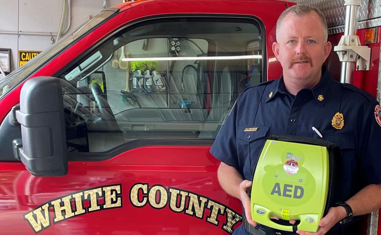 White County Fire Chief Seth Weaver with the AED. (Submitted photos)
