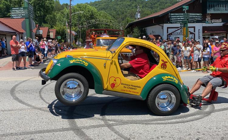 Even with sunny skies, Saturday in Helen was brightened by the annual Shriners parade through downtown. The June 12 procession through downtown featured a crowd-pleasing showcase of motor vehicles, costumes and good-natured antics. (Photos/Stephanie Hill)