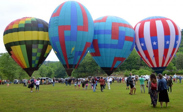 Conditions prevented the race from starting during Thursday morning's kickoff event on June 3, however, the crowd got to see the hot air balloons on display and chat with pilots. (Photo/Wayne Hardy)
