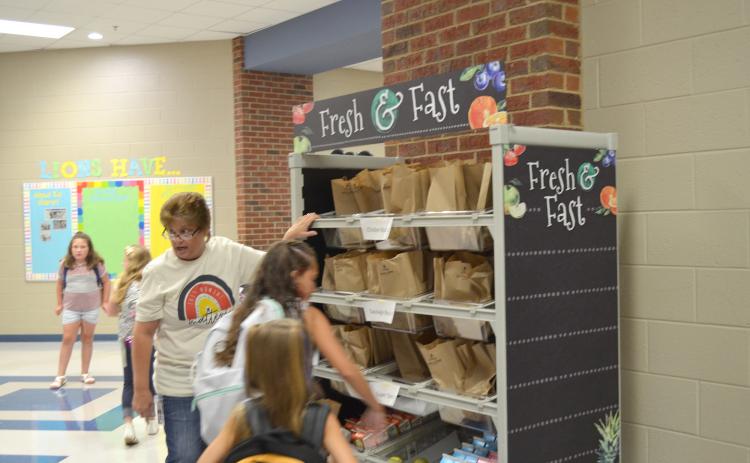The school system received a grant from No Kid Hungry and used that money to purchase the carts. Pictured are the carts at Mossy Creek Elementary School on the first day of school. (Photo/Stephanie Hill)