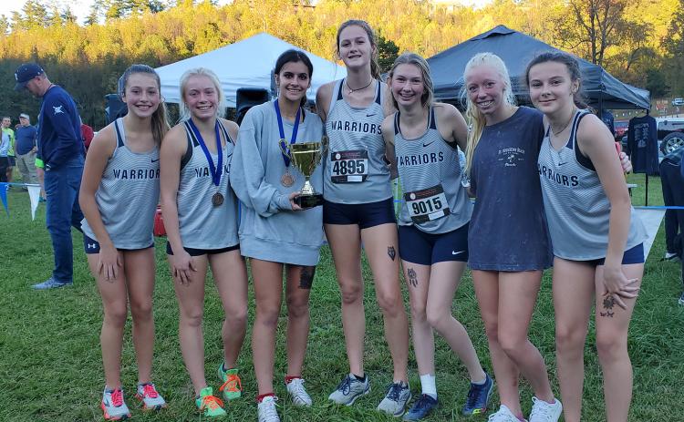The Lady Warriors are headed back to the state meet after finishing second in the Region 7-AAA meet last week at Unicoi State Park. The runners will compete in the Class AAA race Friday at 11:15 a.m. in Carrollton. Members of the team are, front left, Emma Lightsey, Nealeigh Broadwell, Lily Gearing, Brianna Bilhovde, Lydia Davidson, Reese Vandegriff, and Emma Marrow. (Photo/Mark Turner)