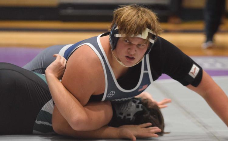 JD Trowell dominated a pair of 285-pound divison matches during the 7-AAA Area Duals. Trowell posted a pair of first period pins itn the Warriors' win on the way to the program's first area duals championship. 