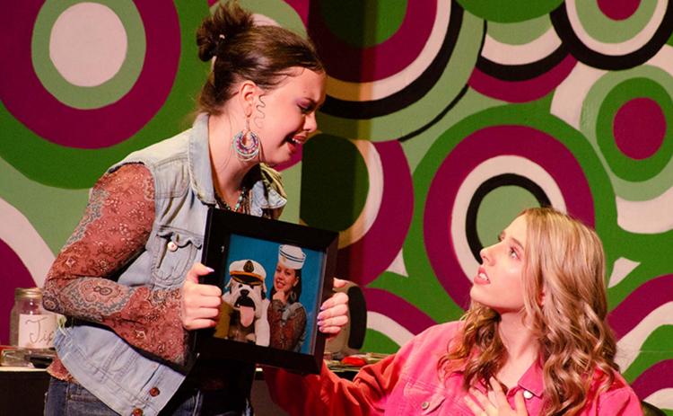 Mollie Cutchshaw and Nealy Webster as Paulette Bonafonté and Elle Woods in Legally Blonde the Musical.