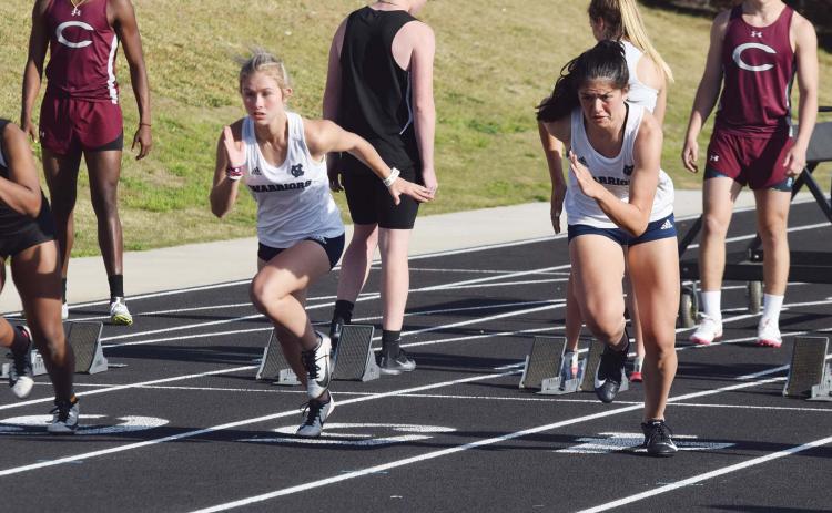 White County's Emma Hare, left, and Adelynn Knight take off at the start of the 100-meter race last week at Chestatee. Knight won the race, with Hare finishing second. (Photos/Mark Turner)