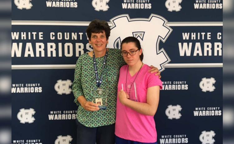 WCSS Nutrition Services Director Abby Rowland (left) and WCHS Senior Joey Cloer were recently recognized for their outstanding work in the Community Based Instruction program. Rowland received the Carter Cruce Business Partnership award and Cloer received the Carter Cruce Worksite Achievement Award. These honors are named after former student Carter Cruce whose work in the program inspired the award. (Submitted Photo)