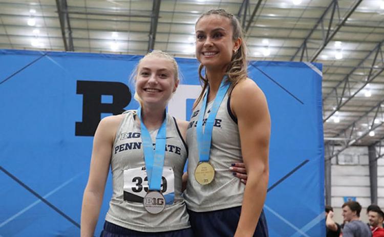 WCHS graduate Rachel Gearing, right, and PSU teammate Hayley Kitching pose for photo after sweeping the top two spots in the 800-meter race at the Big Ten Indoor Championships . (Photo/PSU Athletics)