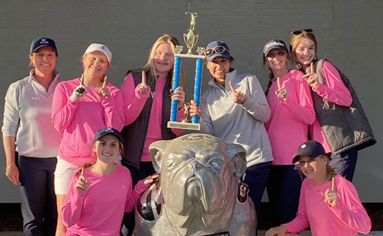 The Lady Warriors show off the trophy after winning the Oconee County Lady Warrior tournament  last weekend at the UGA Golf Course in Athens. Front from left, are  Emma Rogers and Maddie Kate Hall, top row, assistant coach Sandi Craig, Cameron Kimsey, Lauren Nelson, head coach Esta Johnson, Billi Kayl Allison, and Layne Graham. (Photo/WCHS Golf)