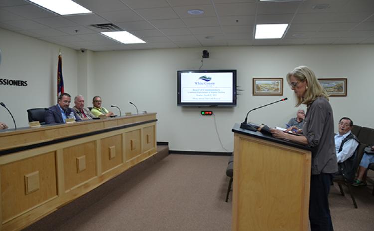 Teresa Stansel reads a “Petition to deny or otherwise void short-term rental applications, conditional-use permits and business tax licenses” at the White County Board of Commissioners meeting March 27. (Photo/Linda Erbele)