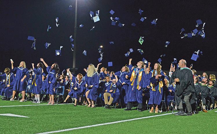 The Class of 2023 tosses their caps in the air at the conclusion of the White County High School graduation ceremony Friday night. (Photo/Samantha Sinclair)