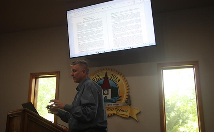 Scott Babel, the project engineer for Smartwave presents the details of the pilot program at the Helen City Commissioners Meeting. (Photo/Jessica Wood) 