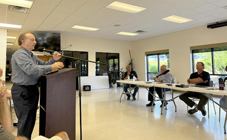 Jon Schwartz addressing the planning commission at the May 30 meeting, regarding his request to change 1299 Ga. Hwy. 17 from C-1 community commercial to R-1 single family residential. (Photo/Linda Erbele)