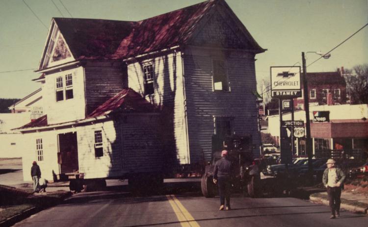 The historic home of Rush Mauney is transported to its new land through downtown Cleveland in 1978. (Photo/submitted)