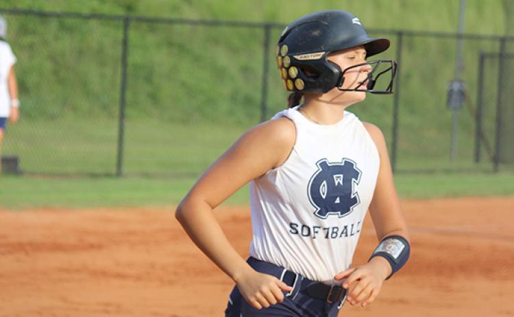 Madi Brooks had a two-run home run in the Lady Warriors' victory over Pickens in the championship game. (Photos/Mark Turner)