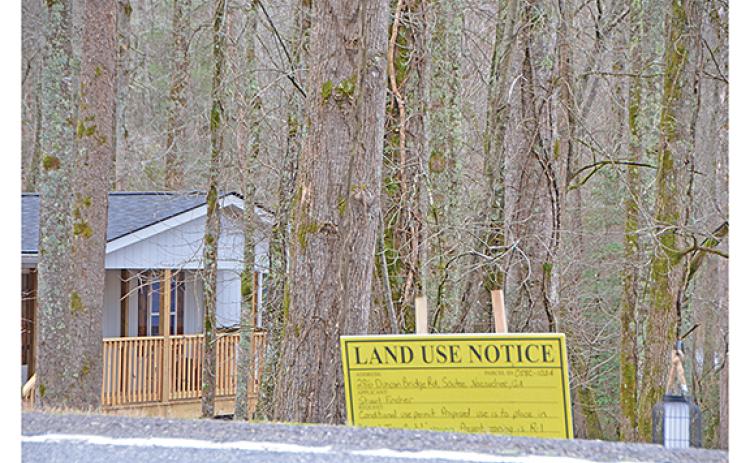 February: Many in the community have begun to dread seeing the yellow signs pop up that indicate someone is requesting a conditional-use permit for short term rental. (Photo/Linda Erbele)