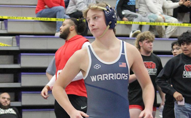 WCHS wrestlers Davin Lightsey, above, and Ollie Weiland are both expected to compete for individual titles this weekend at the area tournaments.  (Photo/Mark Turner)