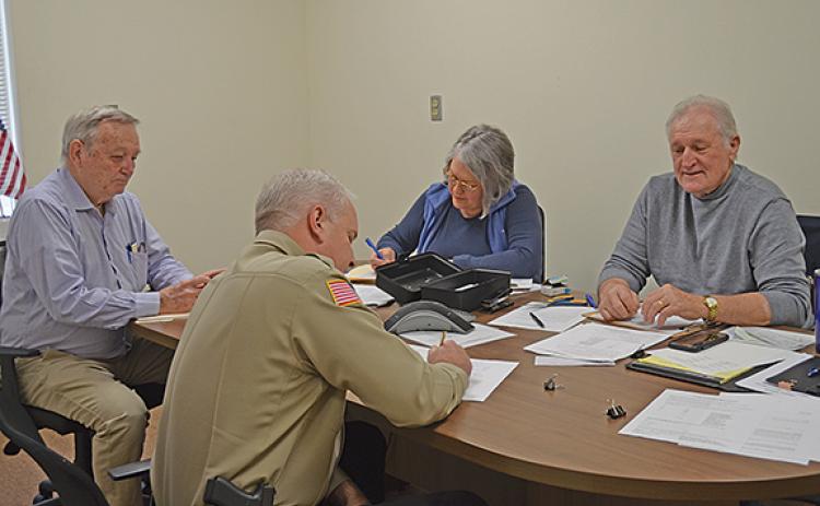 Terry Goodger and Rick Kelley qualify for office with the White County Republican Party — represented by Susan Cremering and Chair Ron Webb — in the White County Elections and Registrations office’s conference room. (Photo/Samantha Sinclair)