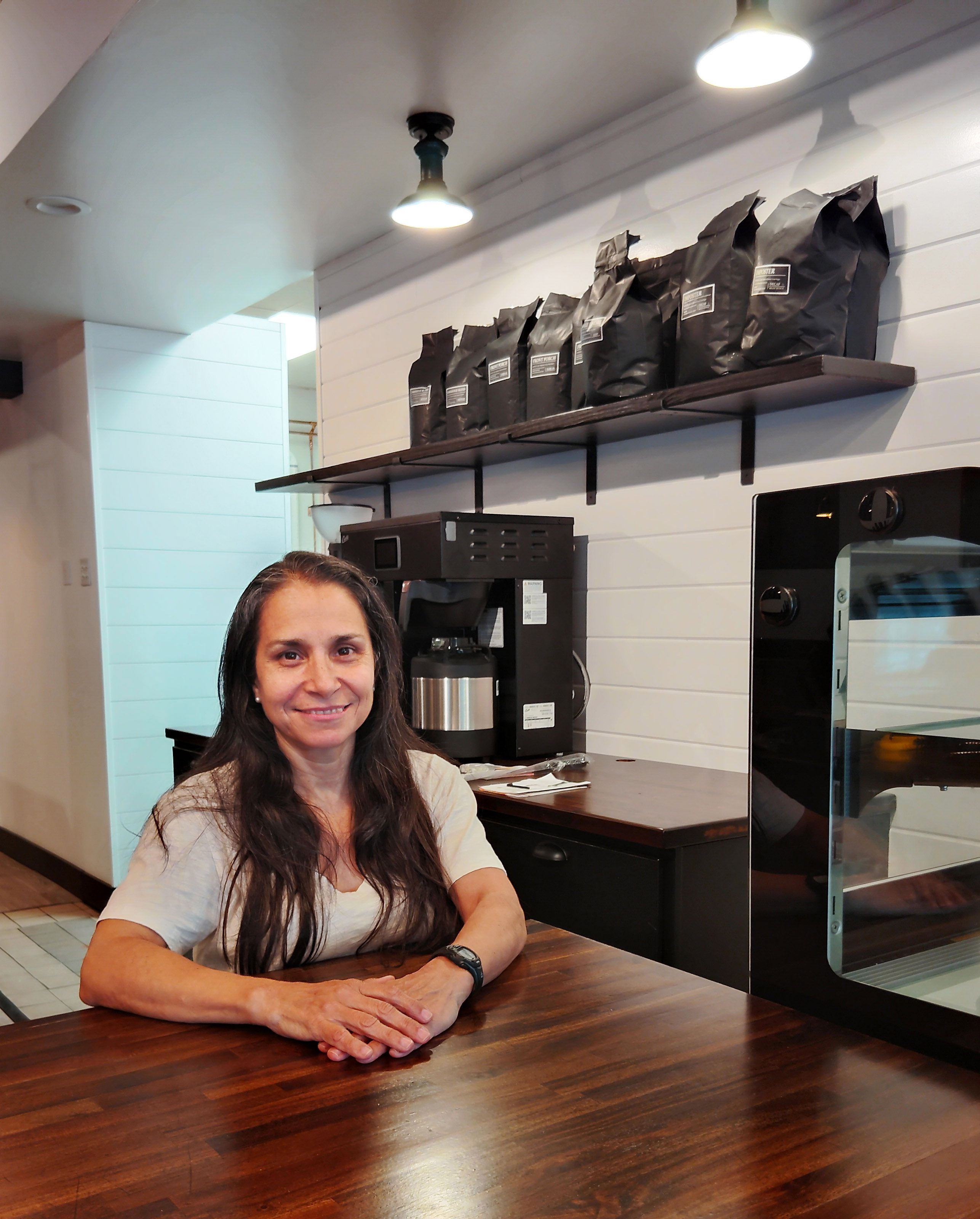 Marilyn Martin and her husband Stephen Martin, not pictured, own Farmhouse Coffee in Cleveland. The coffee shop will open its larger space on Friday, June 12. DENISE ETHERIDGE/WCN
