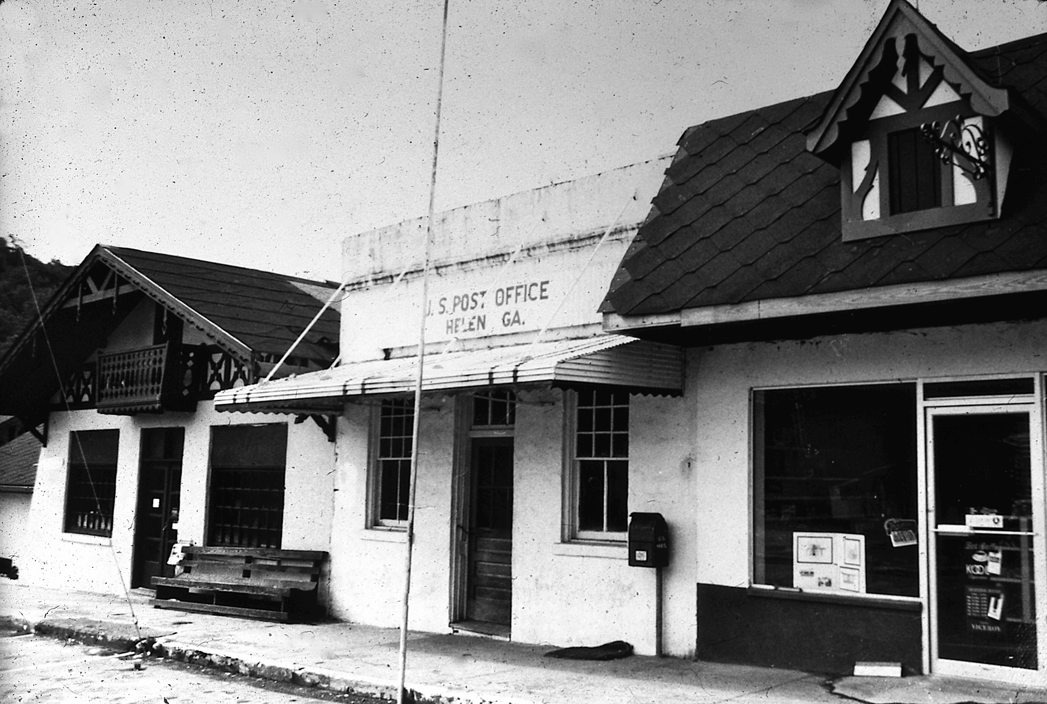 The old Helen Post Office is shown next to a building undergoing a change in façade for Alpine Helen. Photo courtesy of David Greear