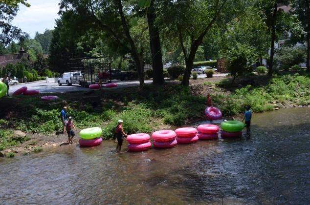 Because of the downed trees, tubers had to get out of the river just before the bridge on Edelweiss Strasse. (Photo/Stephanie Hill)