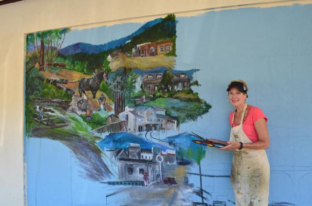 When completed, the new mural by Anna Wilkins will show 100 years of Helen's history. (Photo/Stephanie Hill)