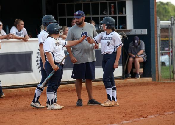 WCHS head coach Drew Owens, middle, and the Lady Warriors are looking to make another playoff run this fall. (Photo/Mark Turner)