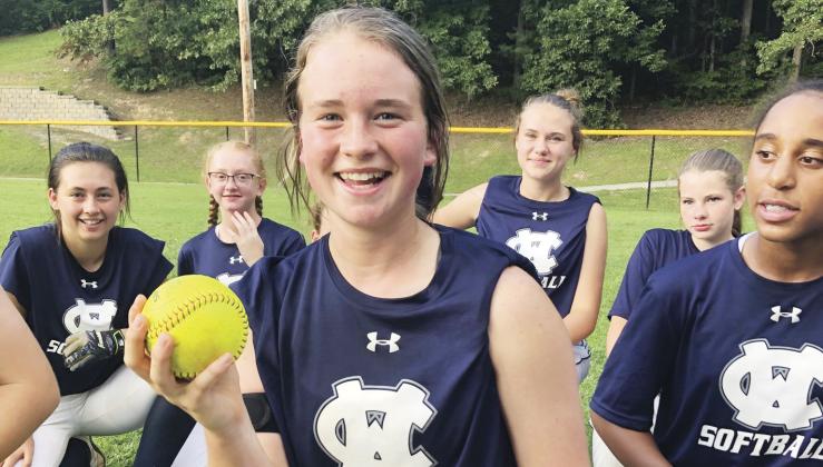 Gabby Whiddon shows off the ball after hitting a game-winning home run in the win over Union County last week. (Photo/WCMS Athletics)