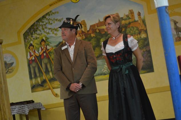 Jerry Brown, Alpine Helen/White County Convention &amp; Visitors Bureau Executive Director, and Cinnamon Spurlock, Helen Mayor, watch the trailer during Helen's 50th birthday party on Friday, Sept. 20. (Photo/Stephanie Hill)