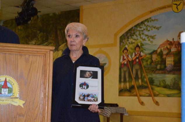 Linda Fowler got teary eyed after being presented the photo display that was put onto the Hall of Fame. (Photo/Stephanie Hill)