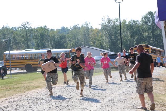 The White County High School JROTC Raiders' mixed team took the top honors during the season-opening competition last weekend at North Forsyth High School. The WCHS athletes, including Riley Egerton, competed in events such as the gauntlet, team tire flip, rope bridge, biathlon obstacle course, Marine obstacle course, and cross-country-rescue during the competition. See more photos in this week's White County News.