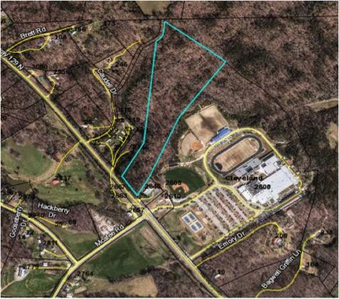 This image, presented at the Aug. 29 school board meeting, shows the property to be purchased bordered in blue near White County High School.