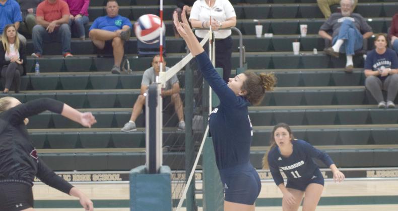 Senior Hope Thomas blocks a shot during the win over Chestatee last week at the region tournament. During the tournament, Thomas was named to the All-Region second team. (Photo/MarkTurner)