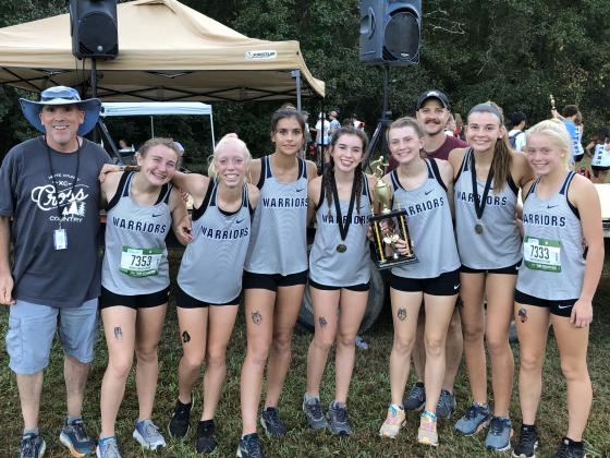 The Lady Warriors posted a runner-up finish in the girls' varsity division behind Oconee County. Members of the WCHS squad are, from left, assistant coach Tom O'Bryant, Josie Stover, Reese Vandegriff, Lily Gearing, Sydnee Nix, Maggie Davidson, head coach Matt Dover, Ellie Gearing, and Nealeigh Broadwell. (Photo/WCHS Athletics)