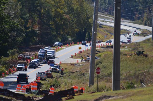 Work crews clear land Tuesday, Oct. 22, to prepare for road construction that will widen Hulsey Road in Cleveland from two lanes to five lanes, including a two-way turn lane. (Photo/Wayne Hardy)