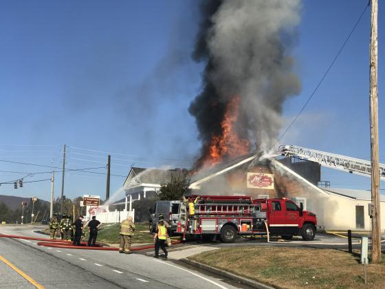 Firefighters worked for several hours on Sunday, Nov. 10, to extinguish the fire that broke out that morning at JW Reeds Tavern. (Photo/Stephanie Hill)