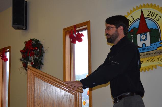 Will Wagner, site manager for Smithgall Woods State Park and the Hardman Farm State Historic Site, speaks to the Helen City Commission Dec. 10. (Photo/Stephanie Hill)