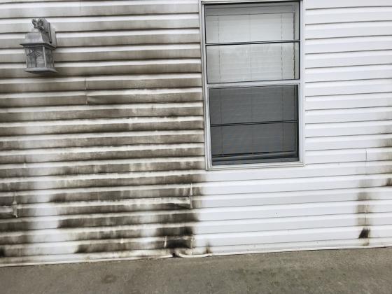 The backside of Solid Rock Baptist Church was damaged after an unidentified man set fire to it. (Photo/Stephanie Hill)
