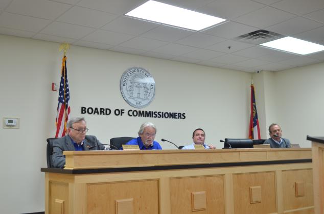 County Commissioners – from left, Terry Goodger, Craig Bryant, Travis Turner and Lyn Holcomb – discuss the outline for establishing a Board of Elections and Registration. Commissioner Edwin Nix was absent. (Photo/Wayne Hardy)
