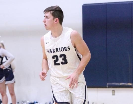 Cooper Turner scored 16 points in the Warriors' region win over West Hall last Friday night in Cleveland. (Photo/Staci Sulhoff)