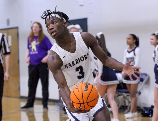 Silas Mulligan scored 16 points in the Warriors' region win over West Hall last Friday night in Cleveland. (Photo/Staci Sulhoff)