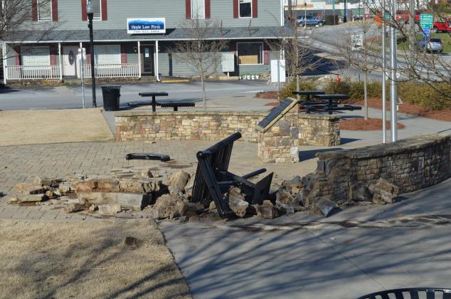 The pursuit ended with the vehicle wrecking at Freedom Park and damaging the brick and stone wall. (Photo/Stephanie Hill)