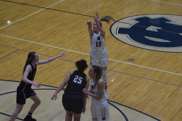 Senior Bentley Cronic scored a game-high 24 points in the opening round of the GHSA girls' state tournament. (Photo/Mark Turner)