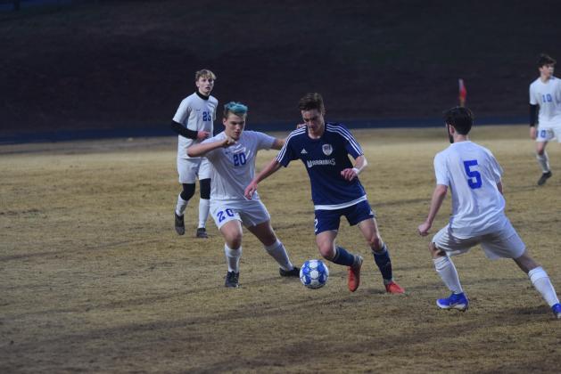 Eli Palmer pushes past a defender during the 7-1 win over Banks County.